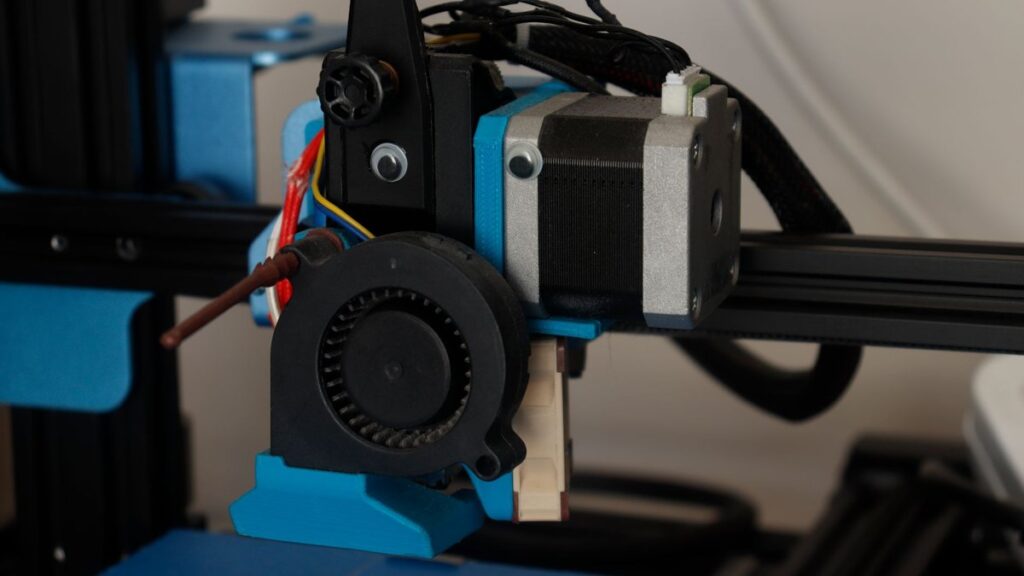 Detailed view of a 3D printer component showcasing its technology and design.