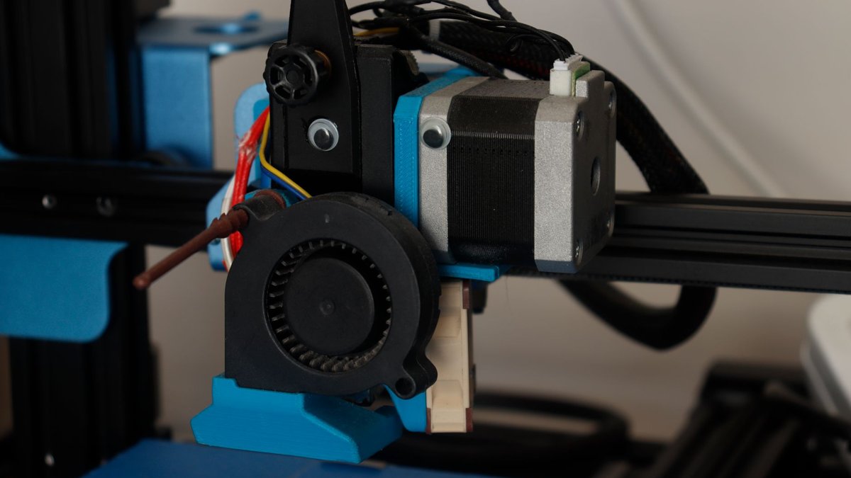 Detailed view of a 3D printer component showcasing its technology and design.